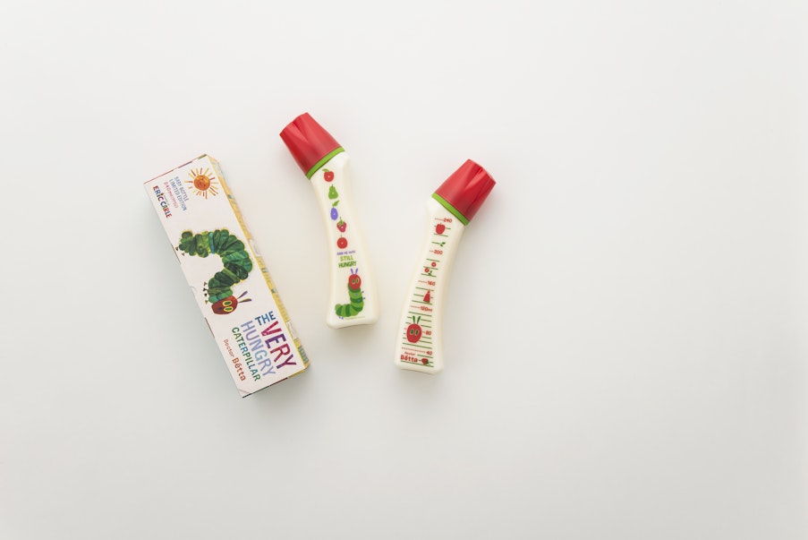 Baby bottle design with cute illustrations of The Very Hungry Caterpillar from the world of picture books.